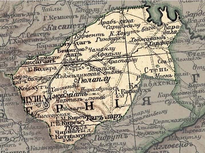 Old printed administrative map showing district boundaries, settlements and relief shading