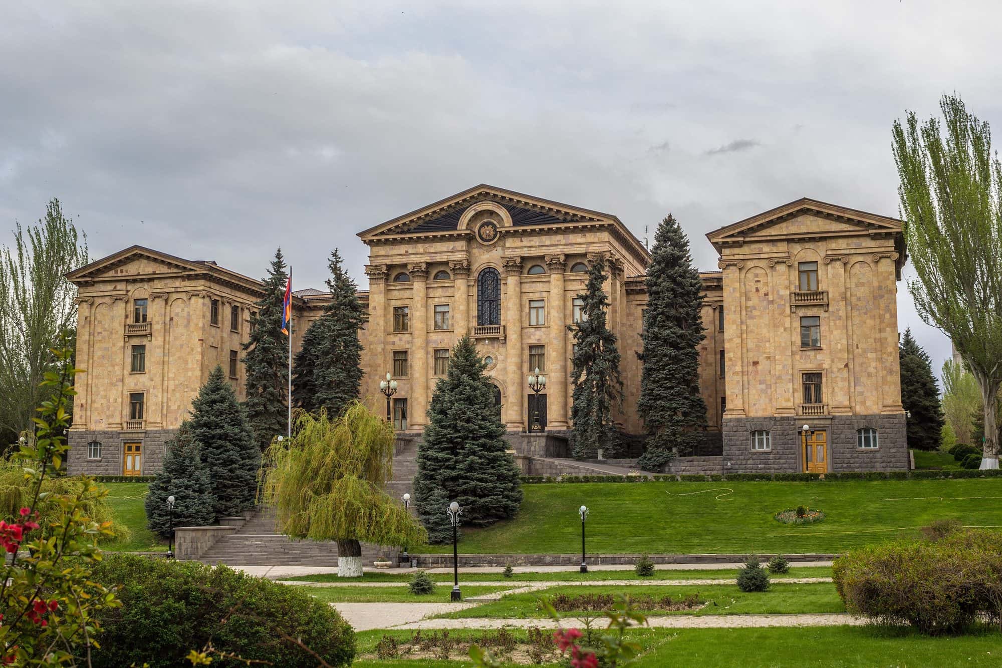 Exterior view of the neoclassical National Assembly building of Armenia in Yerevan, seen from the street
