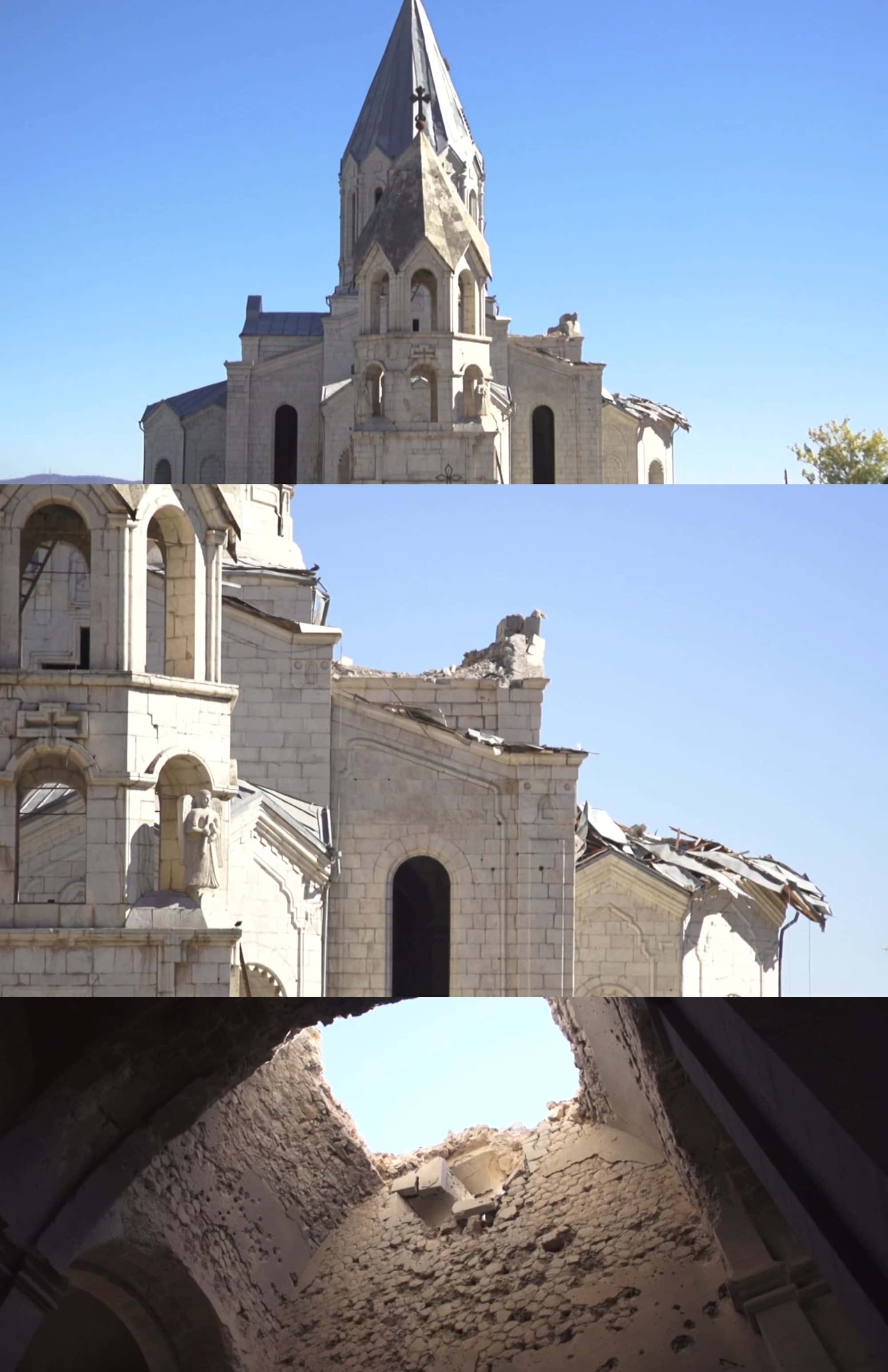 White stone cathedral with a punctured dome roof and rubble on the floor of the damaged interior