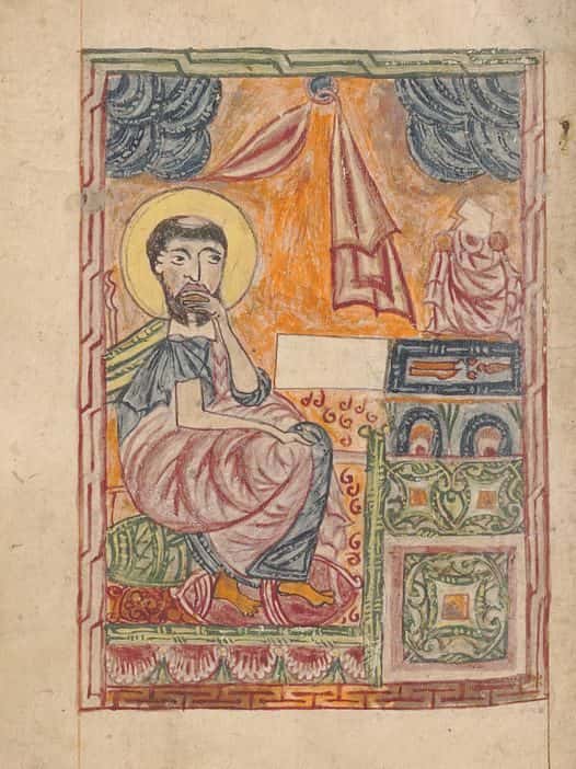 Open manuscript page with Armenian script and a coloured ornamental border